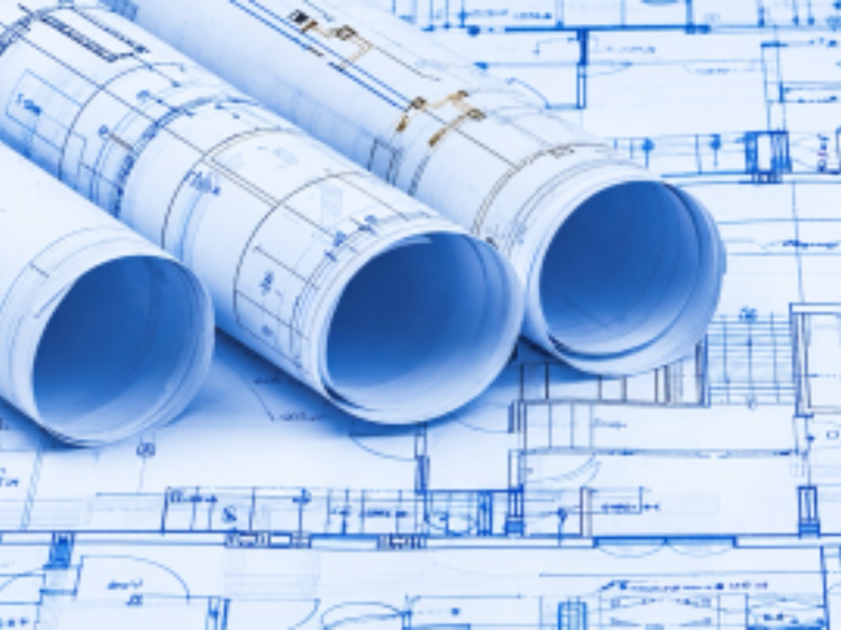 Rolled building plans on a set of drawings
