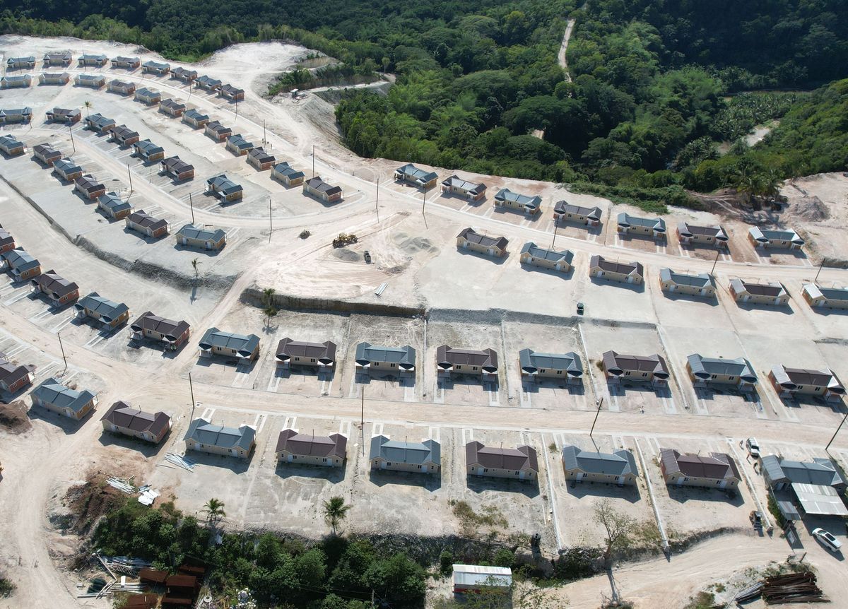 Aerial view of a housing development with new roads and drainage